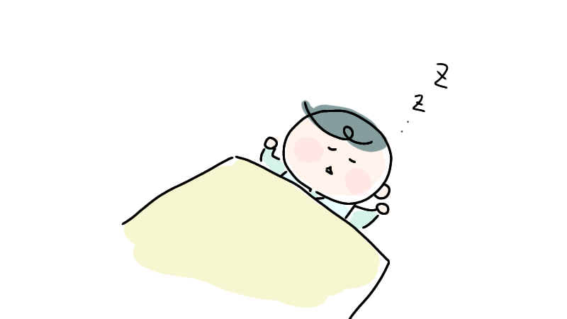 眠る小さい男の子